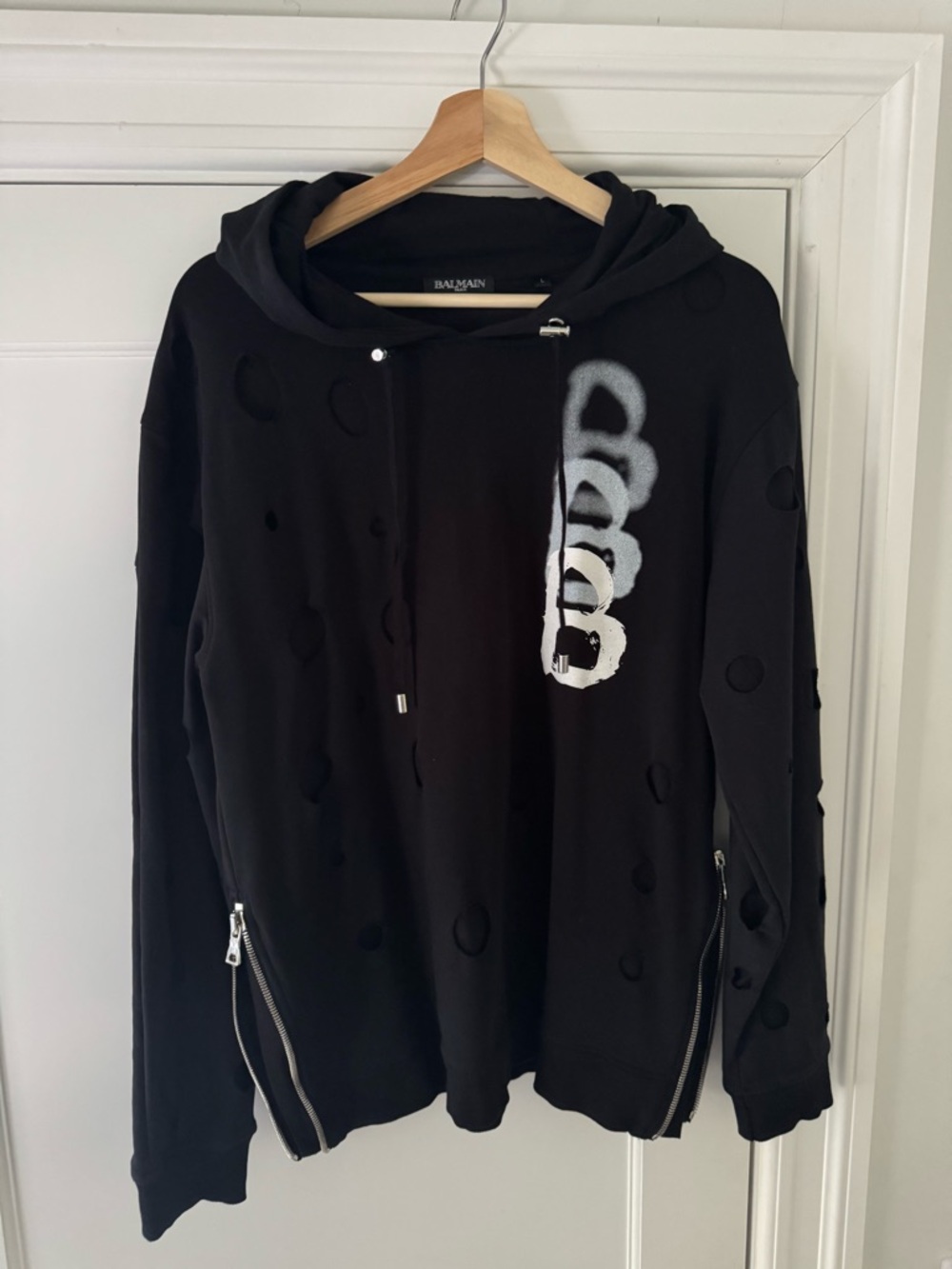 Balmain Black Distressed Hoodie with White Spray Graphic